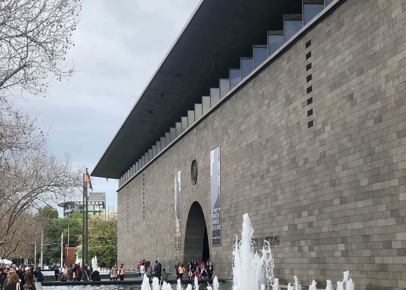 The bluestone facade and arched entrance of NGV International on St Kilda Road